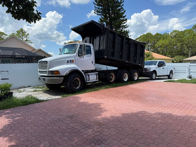 1997 Ford Sterling Tri Axle Dump Truck $31,000  (Palm Bay, FL)