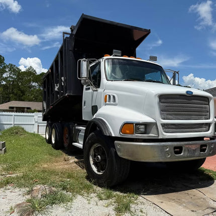 1997 Ford Sterling Tri Axle Dump Truck $31,000  (Palm Bay, FL)